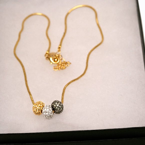 Joan Rivers Jewelry - Joan Rivers Necklace Three Rhinestone Balls on Gold-tone Serpentine neck…